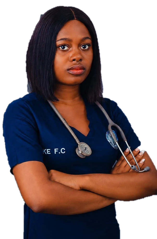 A nurse in navy scrubs with a stethoscope